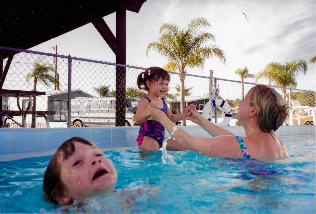 Mother Ignoring Kid Drowning In A Pool